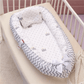 Réducteur de lit bébé gris et blanc motifs couronne 