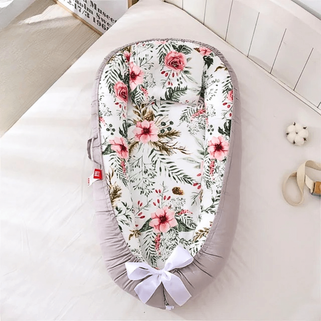 Réducteur de lit bébé fleur