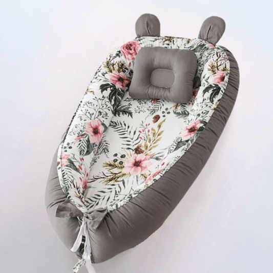 Réducteur de lit pour bébé motifs fleurs et feuillages