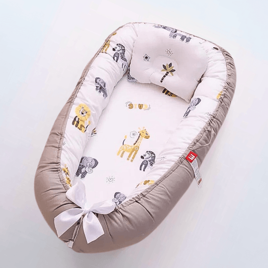 Réducteur de lit pour bébé motifs savane