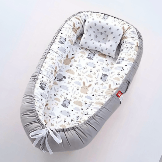Réducteur de lit pour bébé motifs lapins
