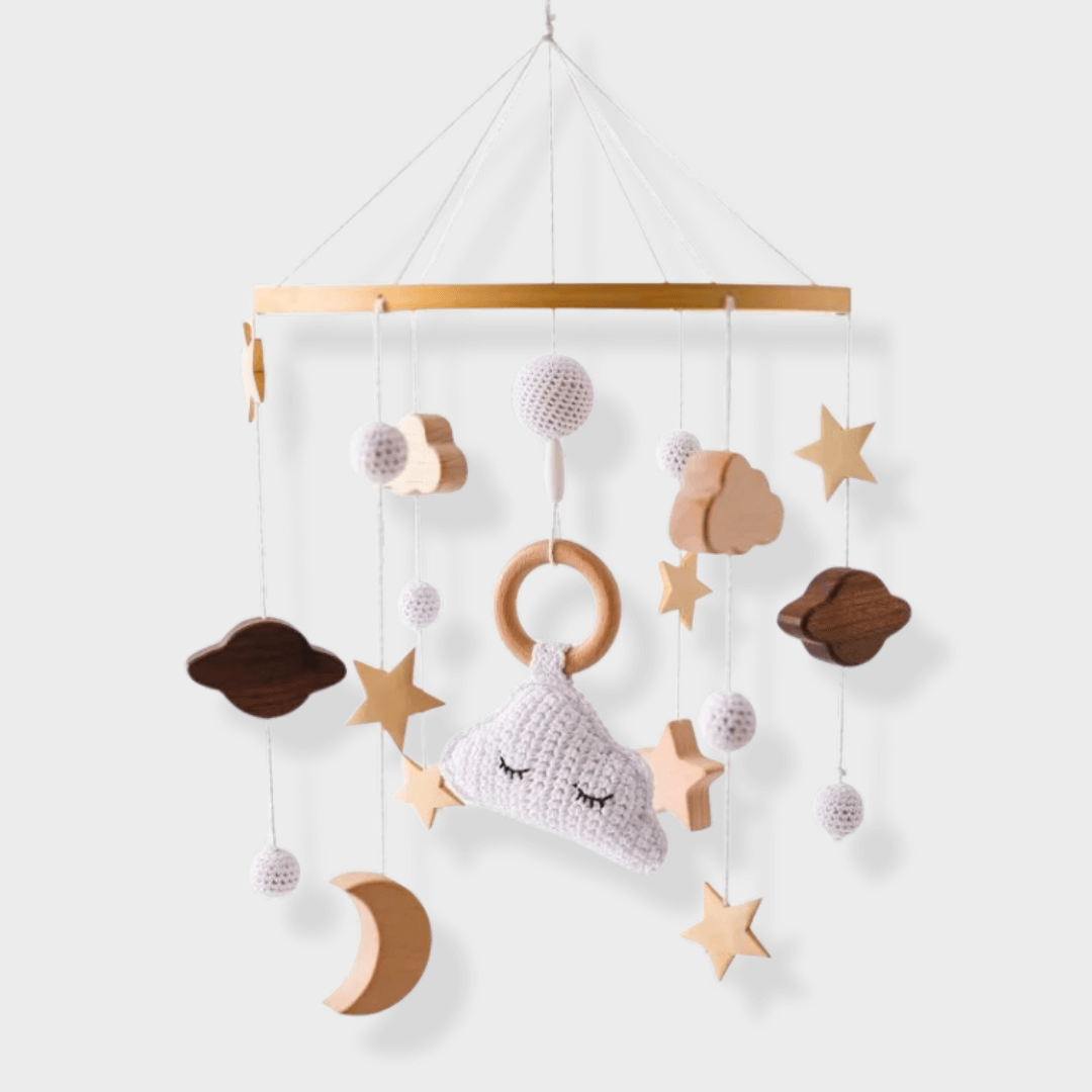Mobile pour lit bébé en laine et en bois avec des motifs de nuages d'étoiles et de lunes